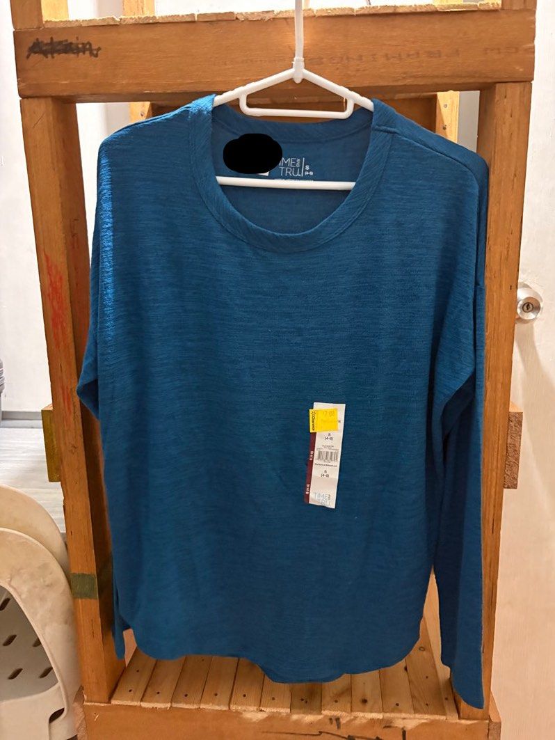 Time and Tru Long Sleeve Shirt (Category: Longsleeves) located in Manila. Submitted by sheseesells (Listing ID 1414304953, Image 1). Description: - Time and Tru long sleeve shirt - Beautiful teal color - Round neckline - Relaxed fit - Brand new with original tags - Versatile for various occasions.