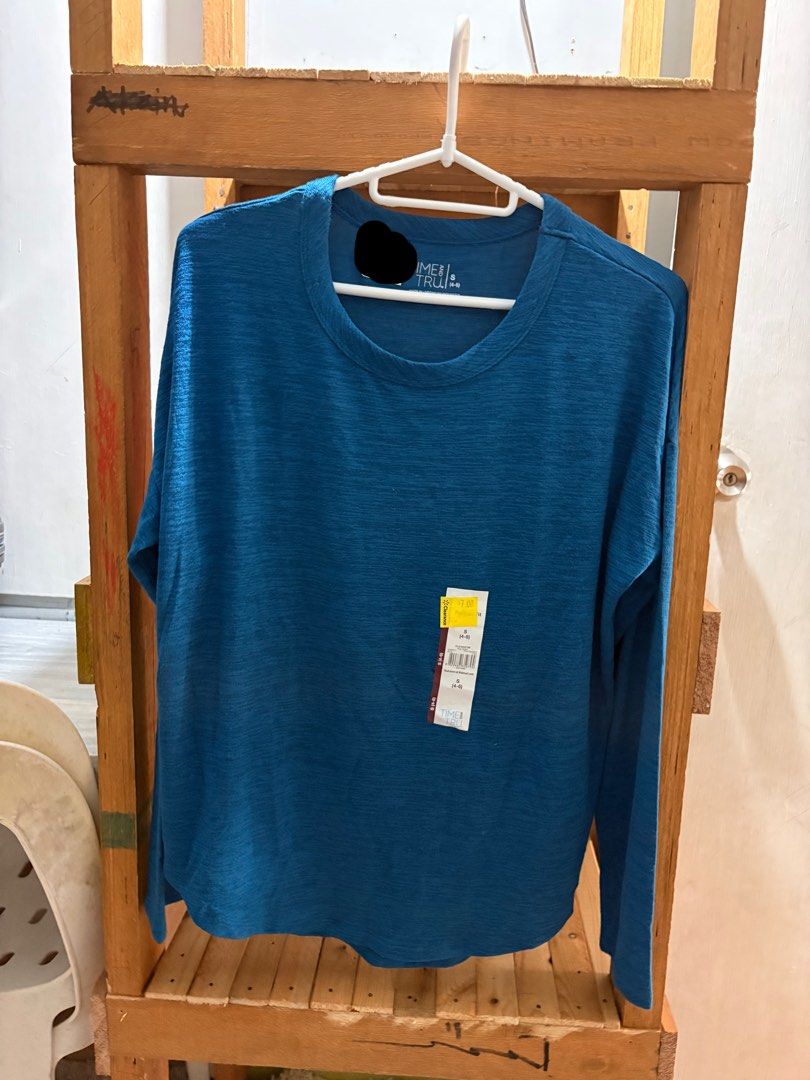 Time and Tru Long Sleeve Shirt (Category: Longsleeves) located in Manila. Submitted by sheseesells (Listing ID 1414304953, Image 2). Description: - Time and Tru long sleeve shirt - Beautiful teal color - Round neckline - Relaxed fit - Brand new with original tags - Versatile for various occasions.