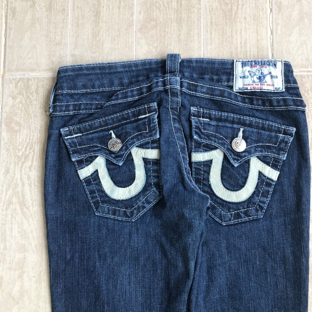 True Religion Jeans Size 24 (Category: Jeans) located in Tagum. Submitted by _mr.thrifter (Listing ID 1414365023, Image 3). Description: - Authentic True Religion jeans - Signature horseshoe logo on back pockets - Made in the USA - Dark blue denim with white stitching - Button and zipper closure - Includes True Religion brand tag Dimes: W27-30 L37 T:10 Hem:6.