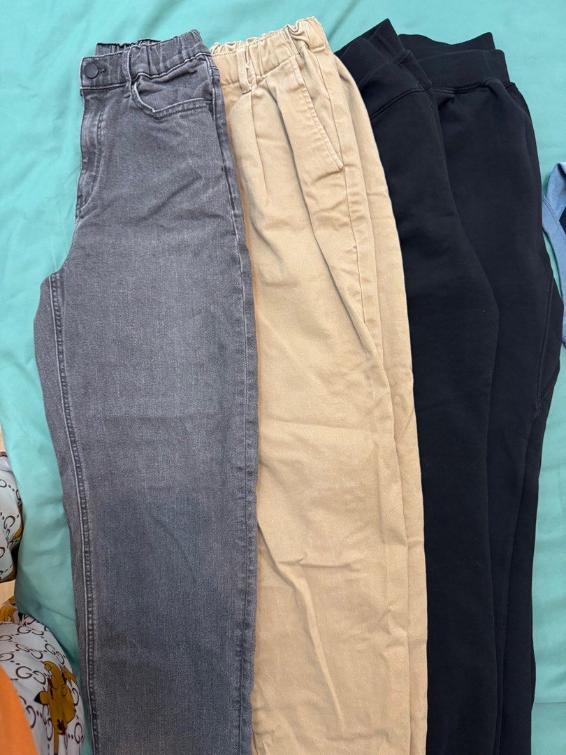Uniqlo pants (all for 500) (Category: Babies & Kids Fashion) located in Manila. Submitted by carlr (Listing ID 1414423602, Image 1). Description: - Gray denim pants with button and zipper closure. (150) - Khaki pants with elastic waistband. (150) - Two pairs of black sweatpants. (160?.