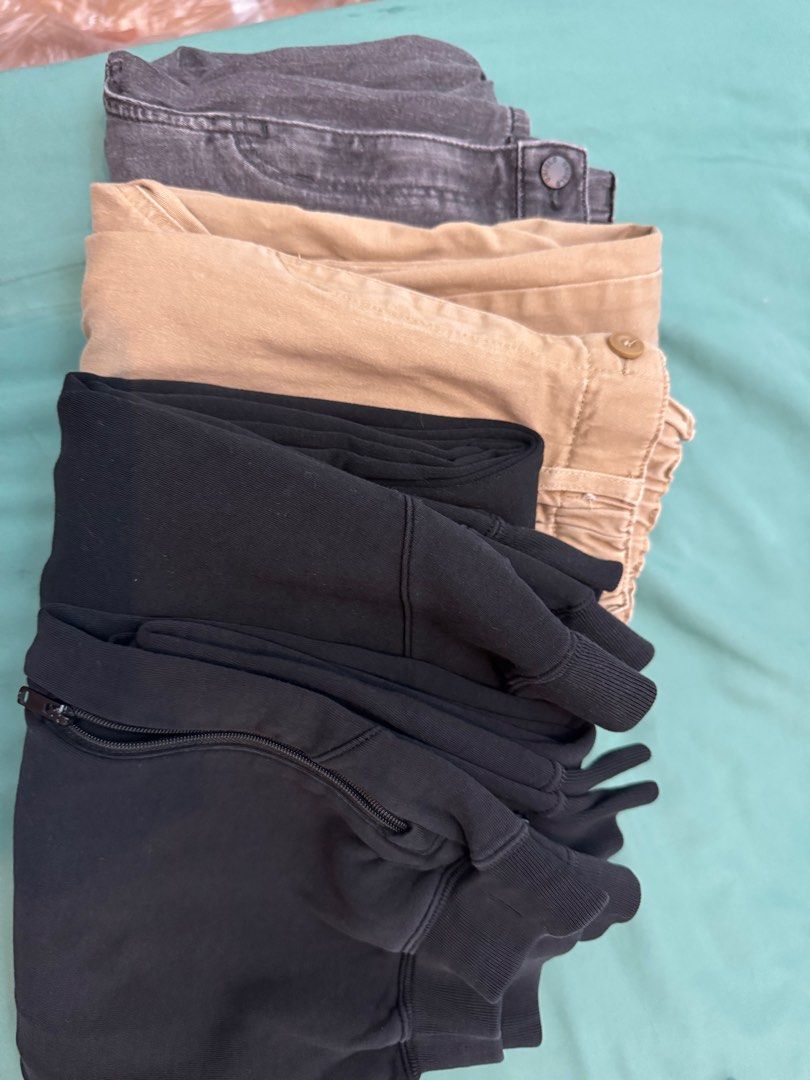 Uniqlo pants (all for 500) (Category: Babies & Kids Fashion) located in Manila. Submitted by carlr (Listing ID 1414423602, Image 2). Description: - Gray denim pants with button and zipper closure. (150) - Khaki pants with elastic waistband. (150) - Two pairs of black sweatpants. (160?.