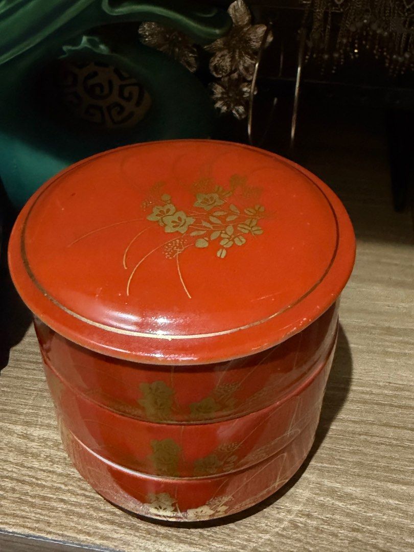 vintage Otagiri Kutani stackable box Jewelry storage (Category: Food Organization & Storage) located in Rizal. Submitted by caintarizal2024 (Listing ID 1414265566, Image 2). Description: The item pictured is a vintage Otagiri Kutani stackable box or set of bowls. It features an iron-red porcelain body with gold gilding of a floral design. The item is a three-tiered stacking container with a lid. It can be used for serving sauces, sushi, or as a b