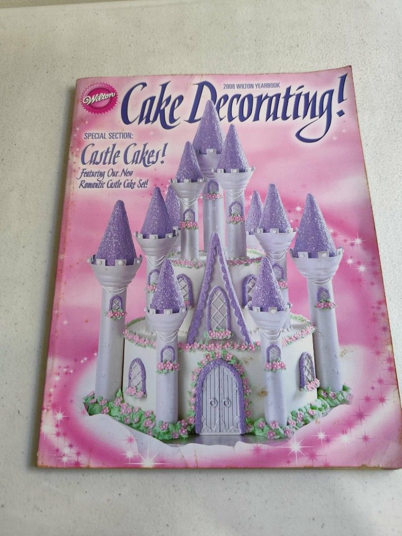 Wilton Cake Decorating Yearbook (Category: Bakeware) located in Quezon City. Submitted by parekoymarekoy (Listing ID 1414329812, Image 1). Description: WILTON CAKE DECORATING SLIGHTLY USED COMPLETE PAGES EXCELLENT CONDITION .