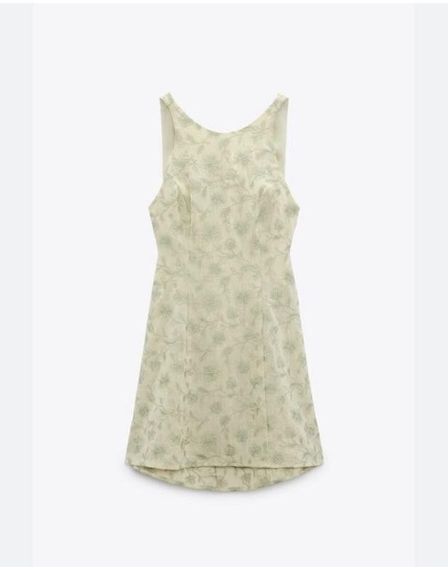 Zara Floral Mini Dress (Category: Dresses) located in Taguig. Submitted by deeclutter88 (Listing ID 1414368057, Image 2). Description: Zara mini dress with floral print, sleeveless, round neck, and fitted silhouette. Features subtle back detail. Textured fabric. Product code: 7969/059. Original price: 59.95€..