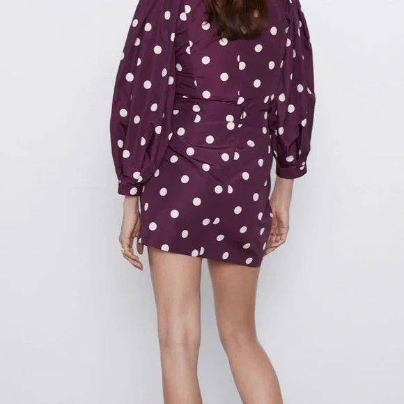 Zara Polka Dot Coordinates (Category: Dresses) located in Taguig. Submitted by deeclutter88 (Listing ID 1414367893, Image 2). Description: deep purple with polka dots. Features a square neckline, long sleeves, and a wrap-style skirt with a waist tie. Great for nights out!.