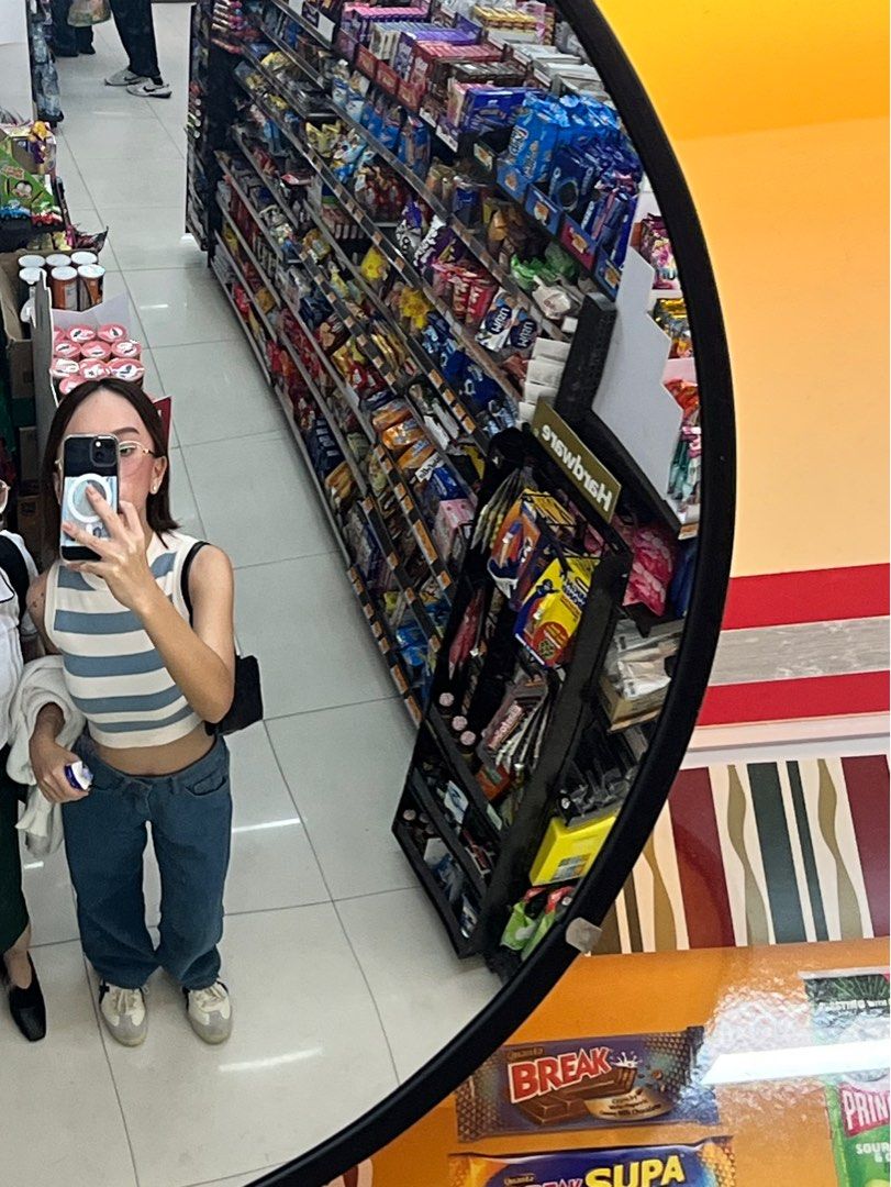 Zara Striped Sleeveless Top (Category: Blouses) located in Quezon City. Submitted by kaeliaaa (Listing ID 1414378584, Image 2). Description: - Cropped length - Color: Blue and cream stripes - Tag visible .