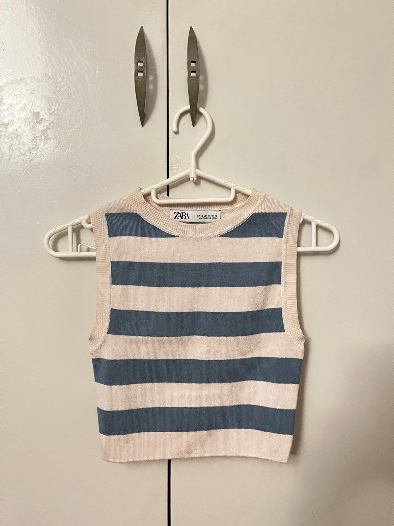 Zara Striped Sleeveless Top (Category: Blouses) located in Quezon City. Submitted by kaeliaaa (Listing ID 1414378584, Image 1). Description: - Cropped length - Color: Blue and cream stripes - Tag visible .