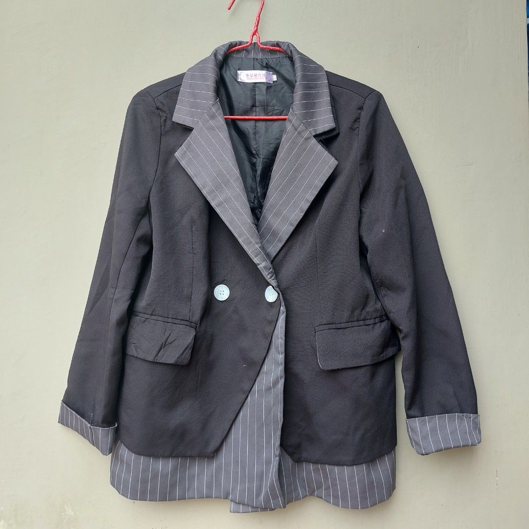 Black and Gray Striped Blazer (Category: Coats, Jackets and Outerwear) located in Bulacan. Submitted by fenph2021 (Listing ID 1414491190, Image 2). Description: - Black blazer - Gray pinstripe detailing - Double-breasted design - Two white buttons L-XL last price posted - Gray pinstripe on lapels and cuffs - Classic and versatile.