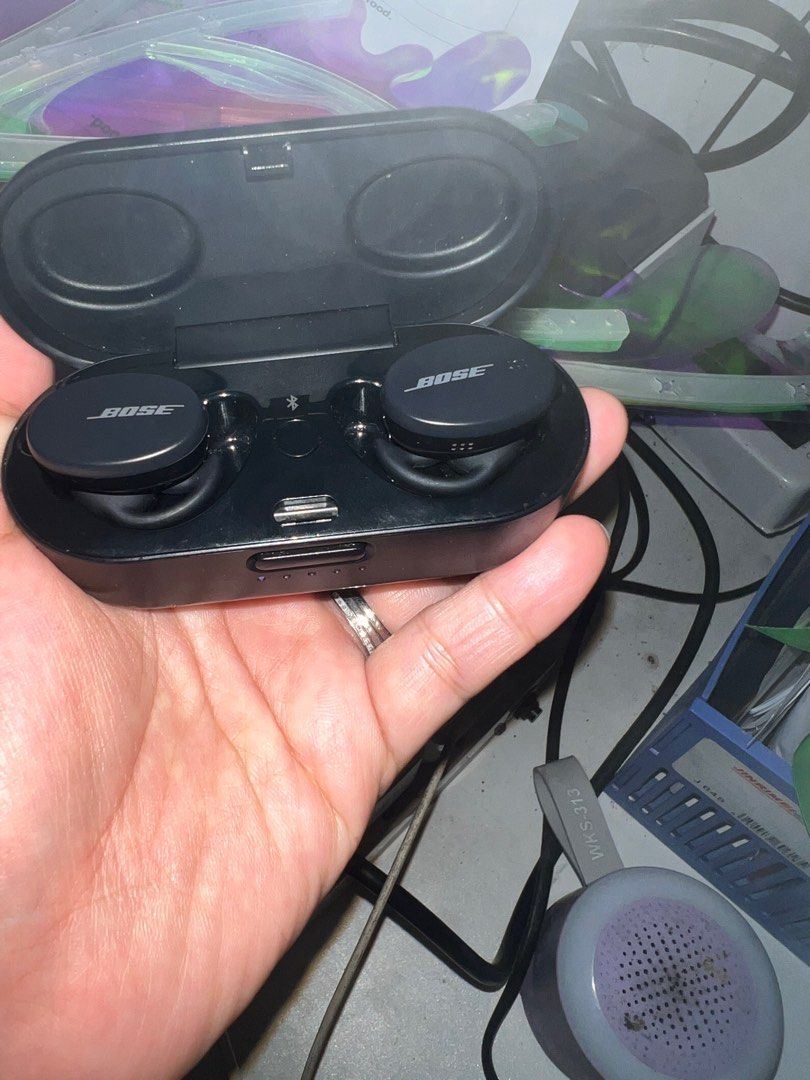 Bose Wireless Earbuds with Charging Case (Category: Earphones) located in San Jose del Monte. Submitted by loved.bags (Listing ID 1414524800, Image 1). Description: Bose wireless earbuds with a charging case. The case has a USB-C port for charging. The earbuds are black and have the Bose logo. The charging case also has a light indicator. The model number is visible on the bottom of the case. Includes the charging case and earbuds. complete with 