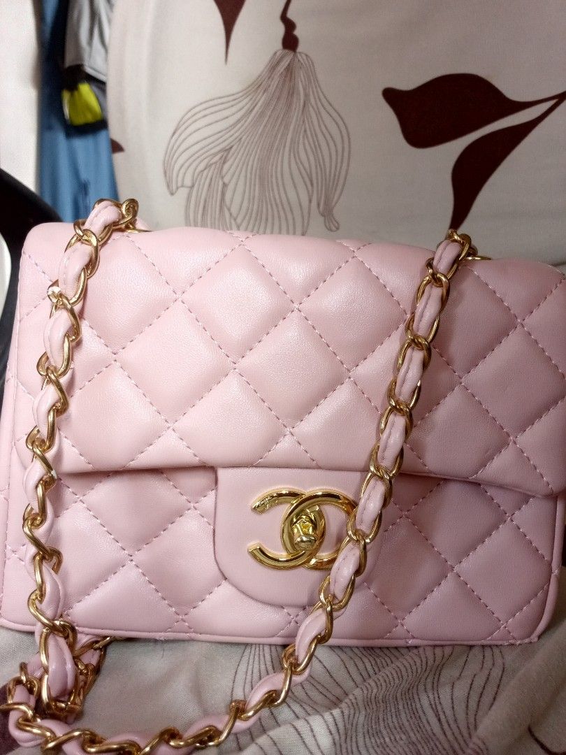 Chanel Pink Quilted Shoulder Bag (Category: Luxury Bags & Wallets) located in Pasig City. Submitted by karenrules (Listing ID 1414482136, Image 2). Description: - Pink quilted shoulder bag - Gold-tone chain strap - CC turn-lock closure - Back pocket - Flap closure - Diamond pattern - Minor wear on corners.