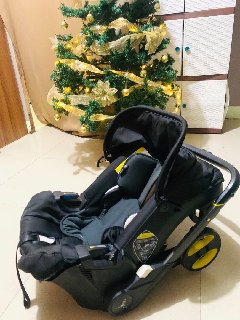 Doona + Infant Car Seat and Stroller - Latest Collection (Category: Strollers) located in Zamboanga. Submitted by mikmikk.23 (Listing ID 1414520309, Image 2). Description: - Doona+ Infant Car Seat & Stroller - Black with yellow accents - Converts from car seat to stroller - Includes car seat and base Used once! .