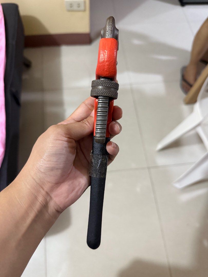 Eagle HD Pipe Wrench 10" (Category: Construction Tools & Equipment) located in Bacoor. Submitted by bbgey (Listing ID 1414466494, Image 2). Description: - Eagle HD pipe wrench - Size: 10 inches - Handle color: Orange and black - Marked "USA STD" - Selling Price: PHP 300 - Used only once. Please PM for sure buyers only. Location for pick-up: Las Pinas City.
