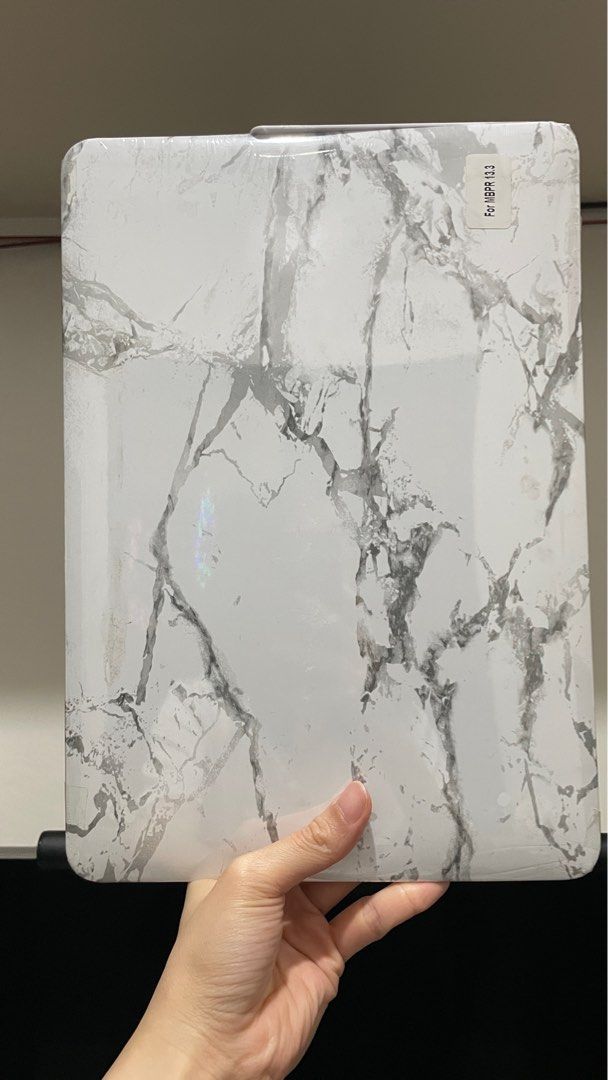 Generic Macbook Pro 13” case (white marble) (Category: Laptop Bags & Sleeves) located in Quezon City. Submitted by shottheserif (Listing ID 1414539027, Image 1). Description: FOR SALE (NO RETURN/REFUND) Generic Macbook Pro 13” case (white marble) - ₱600 Condition: brand new RFS: sold mbp already Location: Del Monte, Quezon City.