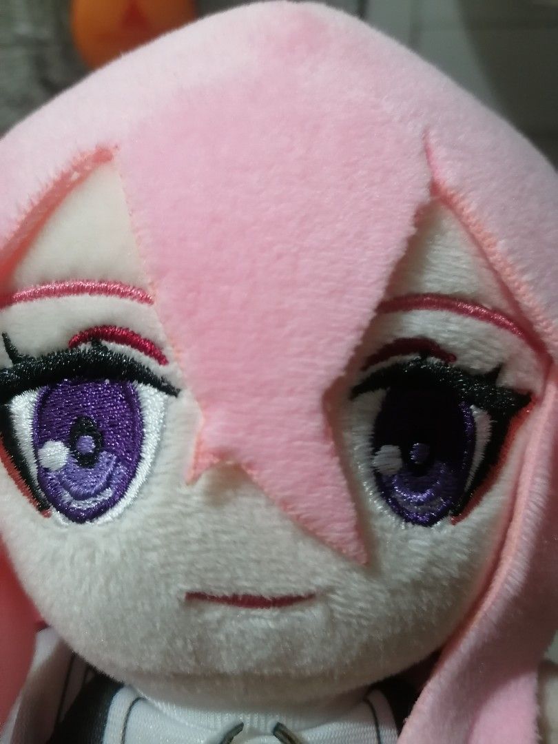 Genshin Impact Yae Miko Plush (Category: Plushies & Soft Toys) located in Pasig City. Submitted by phantasmnyx (Listing ID 1414621993, Image 3). Description: - Yae Miko plushie from Genshin Impact. - Features pink hair and purple eyes. - Detailed outfit with a white top and red accents. - Includes headpiece detail on the back. - Perfect for Genshin Impact fans and collectors..
