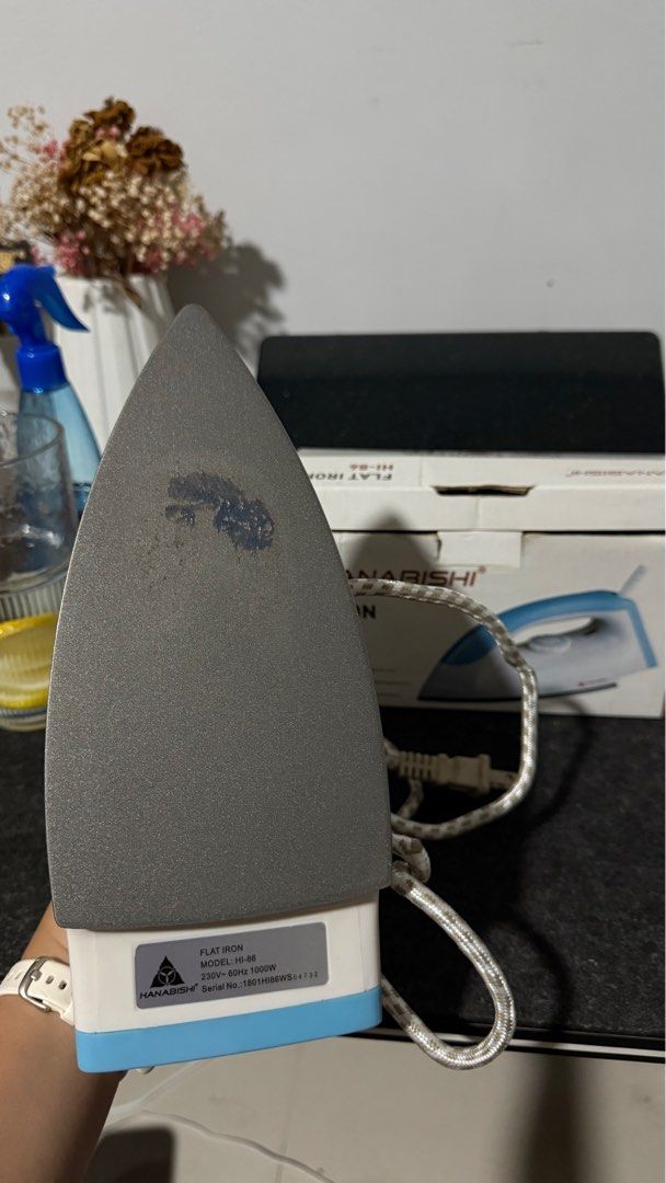 Hanabishi Flat Iron HI-86 (Category: Irons & Steamers) located in Makati City. Submitted by severusss (Listing ID 1414562948, Image 3). Description: - Hanabishi flat iron - Blue and white design - Includes original box - Temperature control dial - Power: 1000W - Voltage: 230V - issue on the last pic, dumikit bedsheet, but doesn’t affect the performance naman Rfs: got a new iron.