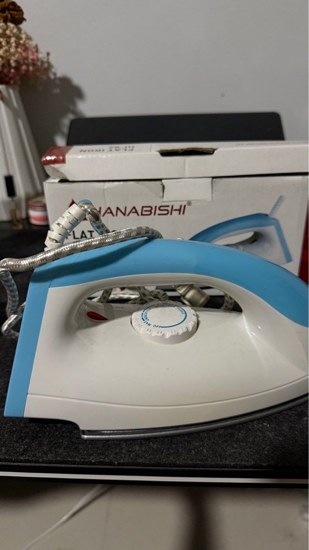 Hanabishi Flat Iron HI-86 (Category: Irons & Steamers) located in Makati City. Submitted by severusss (Listing ID 1414562948, Image 1). Description: - Hanabishi flat iron - Blue and white design - Includes original box - Temperature control dial - Power: 1000W - Voltage: 230V - issue on the last pic, dumikit bedsheet, but doesn’t affect the performance naman Rfs: got a new iron.