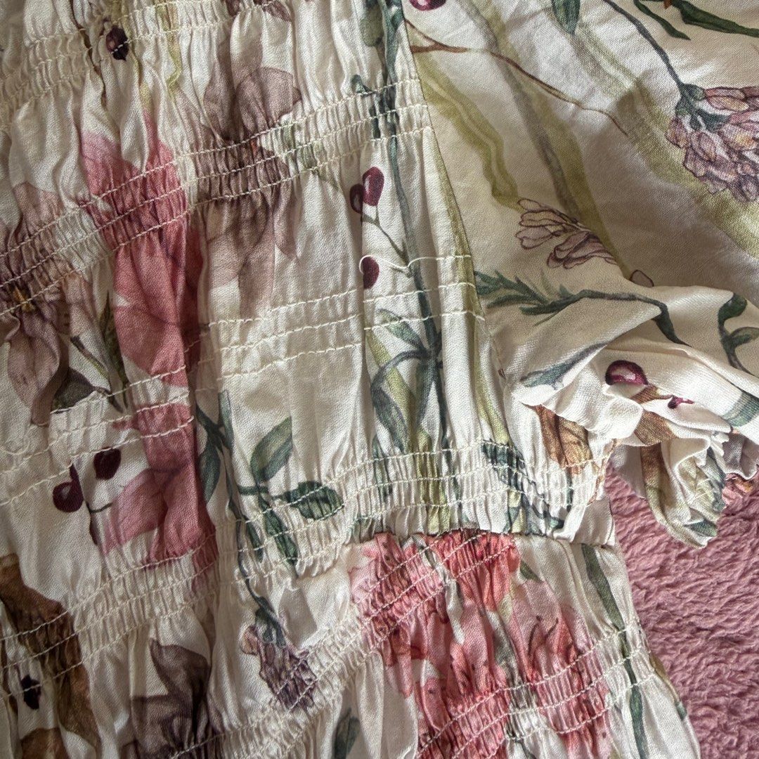 H&M Floral Smocked Top (Category: Sleeveless) located in Argao. Submitted by jowceeee (Listing ID 1414462084, Image 3). Description: - worn twice - unnoticeable stitch issue in the last photo .