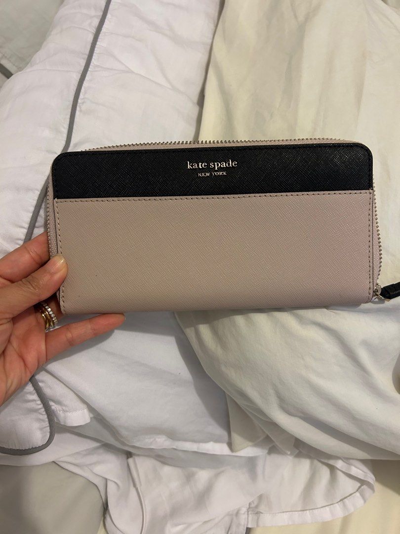 Kate Spade New York Zip Around Wallet (Category: Wallets & Card holders) located in Quezon City. Submitted by simplifiedclosetph (Listing ID 1414535489, Image 1). Description: Brand New Kate Spade Wallet in Nude Color. Bought from Canada in 2023 Never been used RFS: Got married, major decluttering as we moved to a new space! :) .