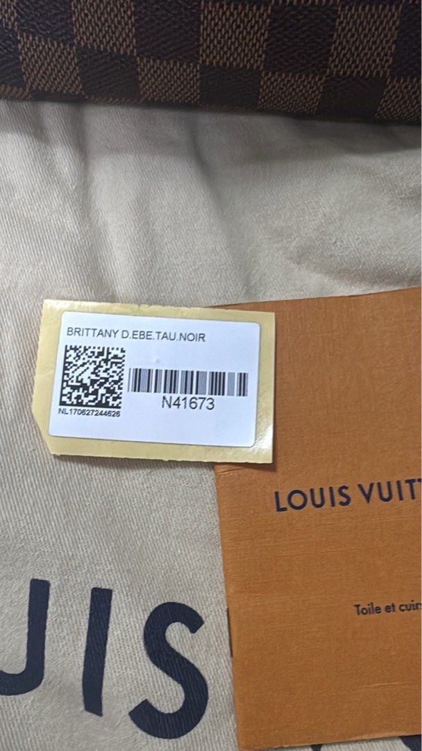 Louis Vuitton brittany (Category: Luxury Bags & Wallets) located in Makati City. Submitted by joyboy0308 (Listing ID 1414577379, Image 3). Description: - Authentic Louis Vuitton Trevi PM handbag - Damier Ebene canvas - Structured shape - Rolled leather handles - Detachable shoulder strap - Includes dust bag, authenticity cards, and tag - Brown textile interior lining - Single zip pocket - Gold-tone hardware.
