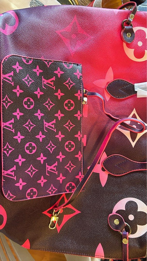 Louis Vuitton Neverfull Tote Bag (Category: Luxury Bags & Wallets) located in Lubao. Submitted by iellahs (Listing ID 1414568519, Image 3). Description: - Louis Vuitton Tote Bag - Eye-catching pink and purple gradient monogram design - Includes a matching pouch - Interior features a stylish striped pattern with the LV logo - Convenient interior zip pocket - Carried with two sturdy handles.