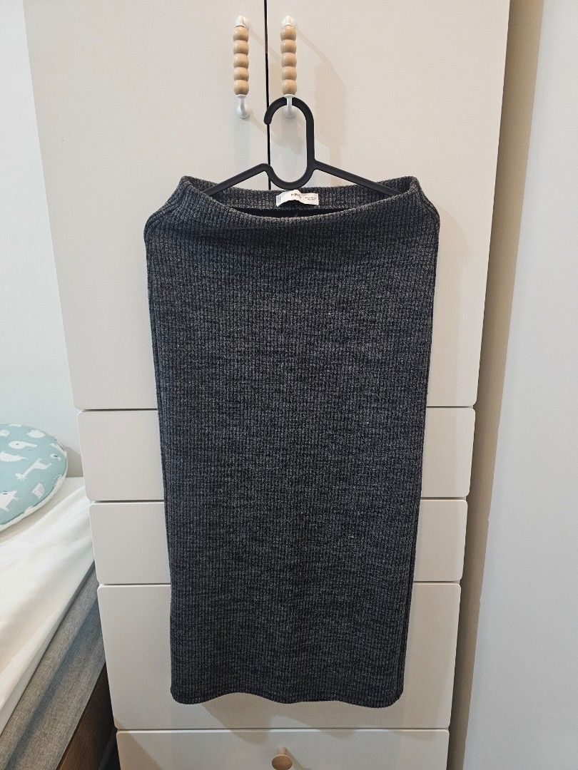 Mango Knitted Pencil Skirt (Category: Skirts) located in Cavite. Submitted by hellovenice_ (Listing ID 1414579742, Image 1). Description: - Mango knitted skirt with slit at the back - Size: XS but very stretchy, can fit up to medium - Color: Dark grey - worn a few times only.