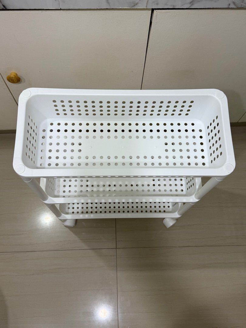 Megabox 3-Tier Wide Rolling Cart (Category: Storage Boxes & Baskets) located in Bacoor. Submitted by bbgey (Listing ID 1414466000, Image 2). Description: Good as new! I have 2 units available! Size (cm): L46.2 / W20.5 / H66.5 RFS: No longer needed No issues. Location for pick-up: Las Pinas - Megabox 3-tier rolling cart - Three spacious white baskets - Perforated bottoms for ventilation - Mounted on wheels for easy mobility - Perfect for kitchen, 