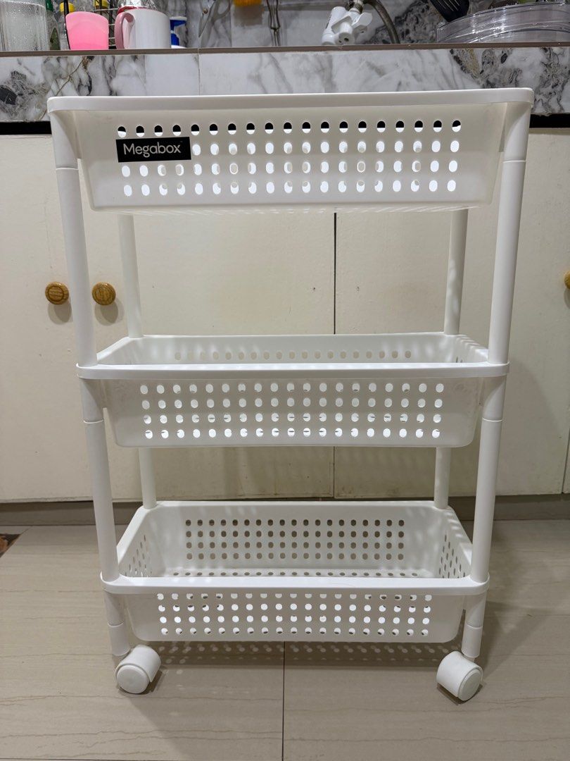 Megabox 3-Tier Wide Rolling Cart (Category: Storage Boxes & Baskets) located in Bacoor. Submitted by bbgey (Listing ID 1414466000, Image 1). Description: Good as new! I have 2 units available! Size (cm): L46.2 / W20.5 / H66.5 RFS: No longer needed No issues. Location for pick-up: Las Pinas - Megabox 3-tier rolling cart - Three spacious white baskets - Perforated bottoms for ventilation - Mounted on wheels for easy mobility - Perfect for kitchen, 