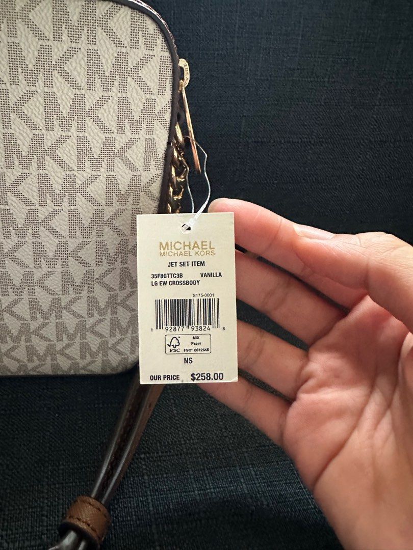 Michael Kors Jet Set Vanilla Crossbody Bag (Category: Cross-body Bags) located in Meycauayan. Submitted by meowskyy (Listing ID 1414530654, Image 3). Description: - Original Michael Kors Jet Set crossbody bag - Color: Vanilla - Features: - Gold chain strap - Brown leather strap - Michael Kors logo pattern - New with tags - No paper bag - Money back if fake.