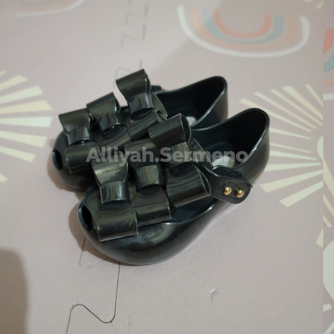 Mini Melissa Black Bow Shoes - US5 - 12CM (Category: Babies & Kids Fashion) located in Manila. Submitted by alliyah.sermeno (Listing ID 1414493550, Image 2). Description: with scent no box.