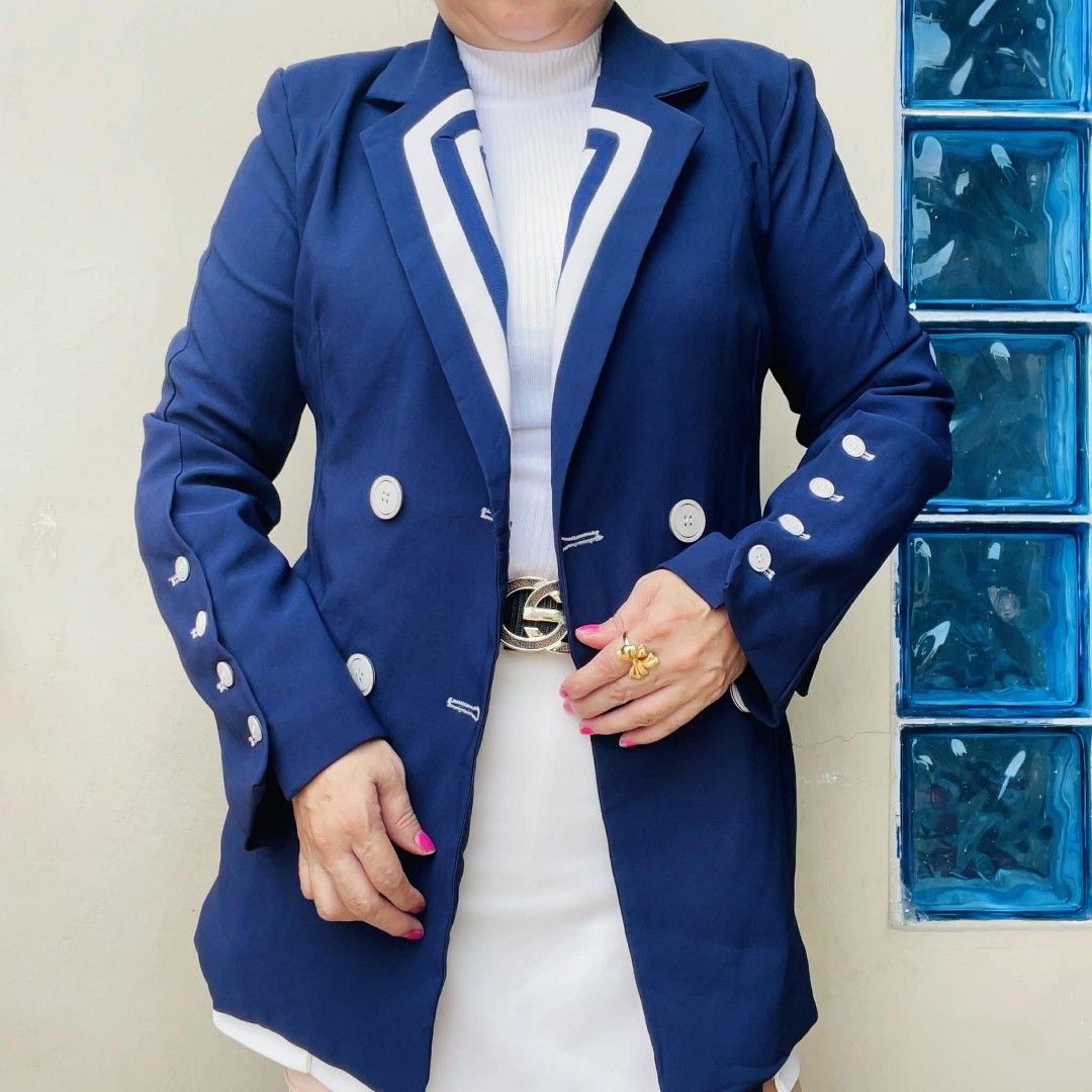 Navy Blue Blazer with White Trim (Category: Coats, Jackets and Outerwear) located in Bulacan. Submitted by fenph2021 (Listing ID 1414492117, Image 1). Description: - Navy blue blazer - White trim detailing - Double-breasted buttons - Decorative sleeve buttons small - Tailored fit - Classic design - Adds sophistication to any outfit - White trim on lapels and hem small -large last price posted.