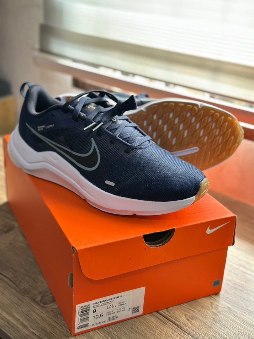 Nike Downshifter 12 Navy Blue Sneakers (Category: Sneakers) located in Pasig City. Submitted by cheapsheet (Listing ID 1414478393, Image 3). Description: - Brand new Nike Downshifter 12 sneakers - Color: Navy blue - Size: 9 US Men’s - Design: White midsole, black swoosh, gum rubber outsole - Includes original box - Stylish and versatile design BRAND NEW AND AUTHENTIC Loc. Pasig city.