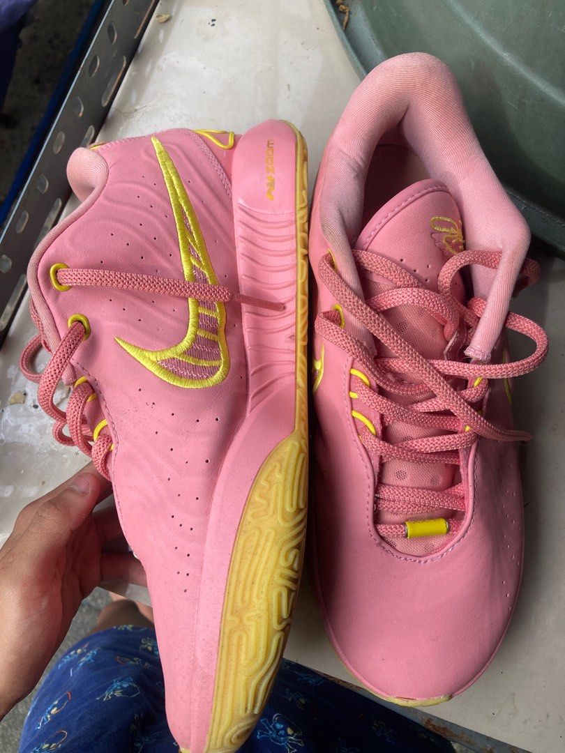 Nike Lebron 21 Low Pink Lemonade (Category: Sneakers) located in Quezon City. Submitted by sensui110 (Listing ID 1414529268, Image 3). Description: - Nike Lebron 21 Low Pink Lemonade - Pink upper with yellow accents - US size 9.5, UK 8.5, EUR 43, CM 27.5 - Handprint design on insole - Made in Vietnam No box.