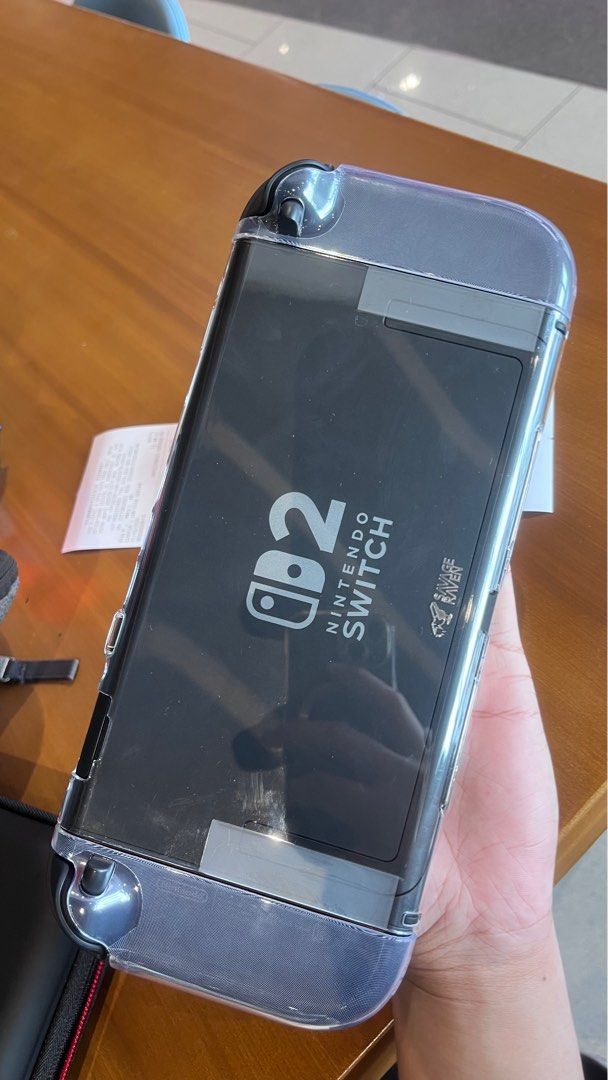 Nintendo Switch 2 Clear Case (Category: Cases & Covers) located in Carmona. Submitted by elisetlicmuan543 (Listing ID 1414601804, Image 3). Description: 50% off na po. Good as new because never used na after trying, binalik ko agad sa box. RFS: I just bought this sa DB Opus Mall noong January 3 (please check photos for receipt). I did not notice na hindi pala nagagamit yung stand when I have this on. Selling this half the price para madispose nal