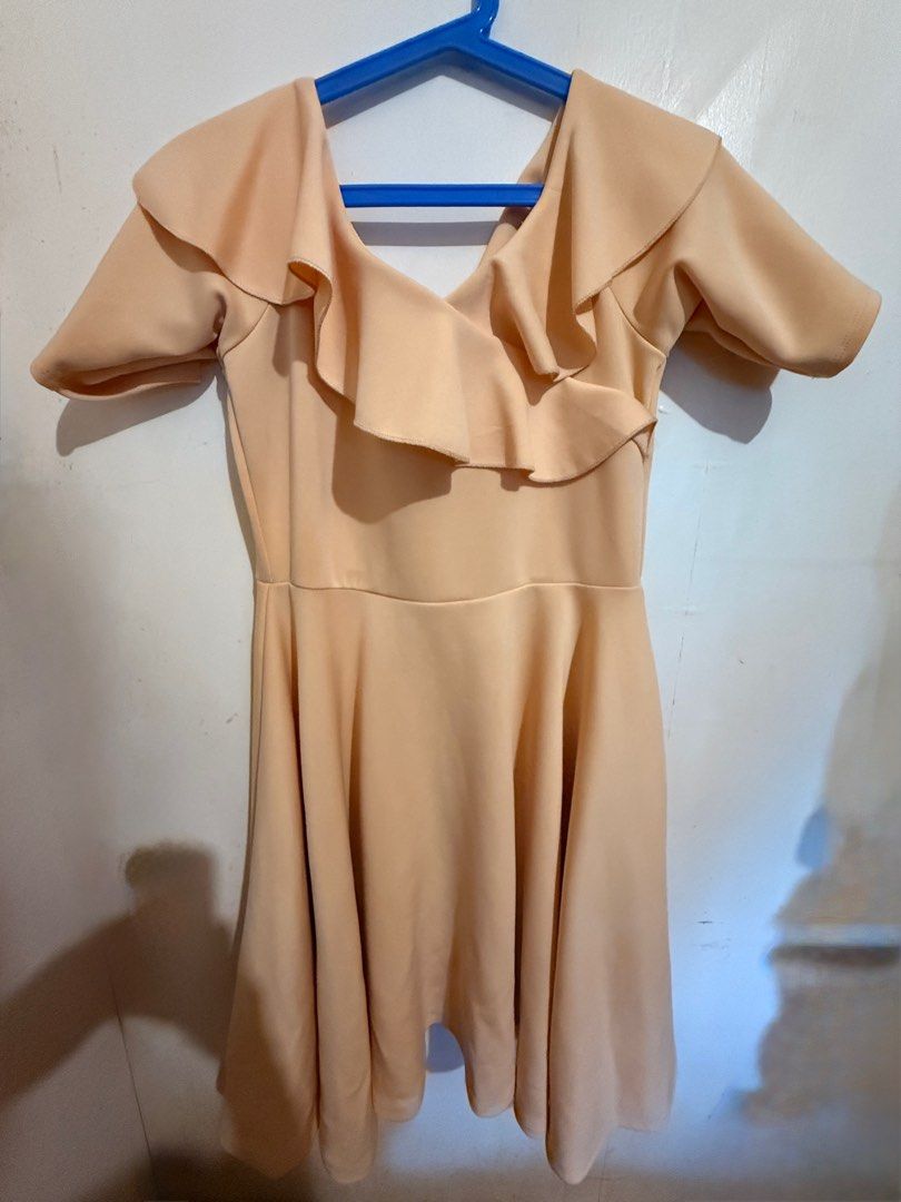Peach Ruffle Sleeve Dress (Category: Dresses) located in Imus. Submitted by ilexncle (Listing ID 1414503854, Image 1). Description: - Peach off-shoulder dress - Ruffle sleeves - Fitted bodice - Flared skirt - Feminine silhouette - Ideal for special occasions or nights out Condition: 9.8/10. Used only once for graduation..