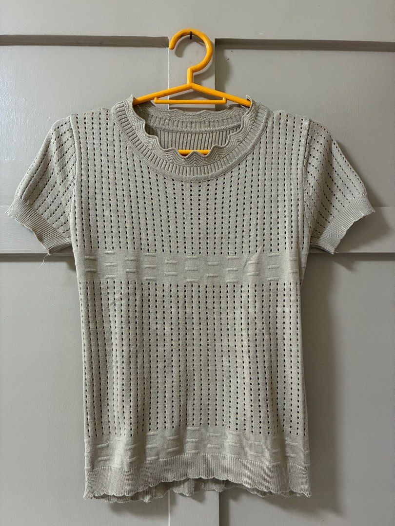 PRE LOVED Beige Knitted Top (Category: Sleeveless) located in San Pedro. Submitted by __reloop__ (Listing ID 1414449355, Image 1). Description: Pre-loved Fits Xs-S body frame - Beige knitted top - Short sleeves - Round neckline - Unique perforated design - Decorative chest band - Scalloped neckline and hem - Lightweight knit material - Suitable for warm weather.