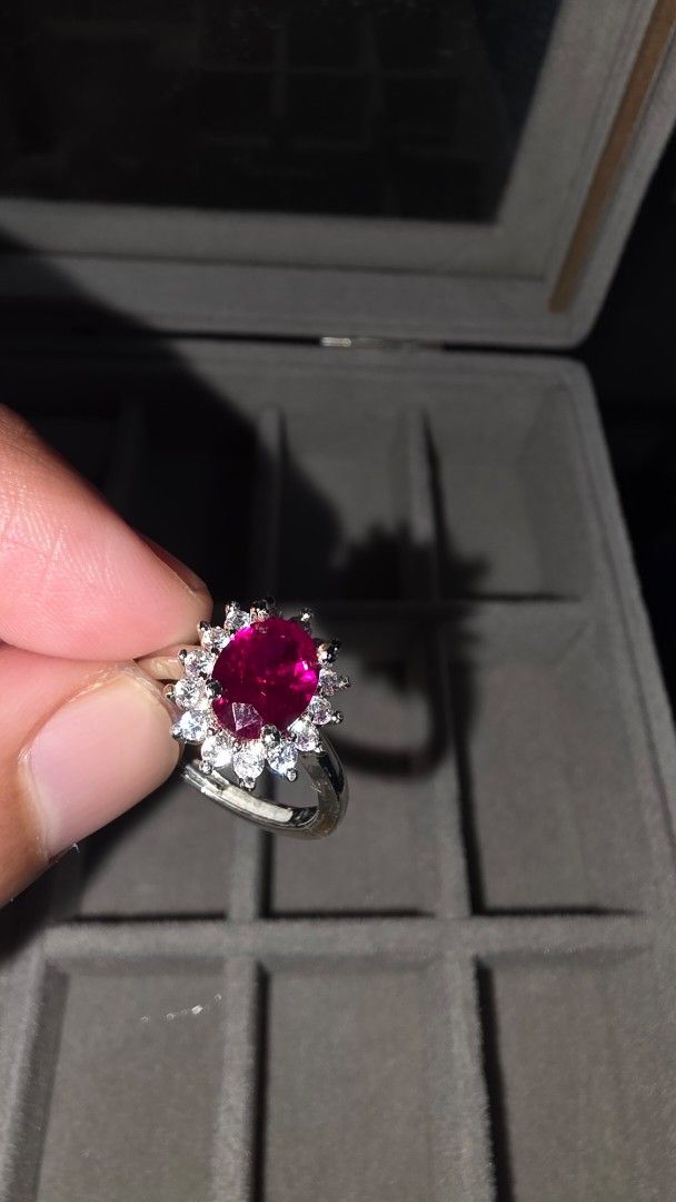 Red ruby ring (Category: Rings) located in Singapore. Submitted by alummahat (Listing ID 1414527382, Image 2). Description: Elegant red ruby ring with a deep, vibrant color and sparkling finish. Classic design, comfortable to wear, and perfect for daily use or special occasions. Princess diana ring style.. pm if u want to see videos.