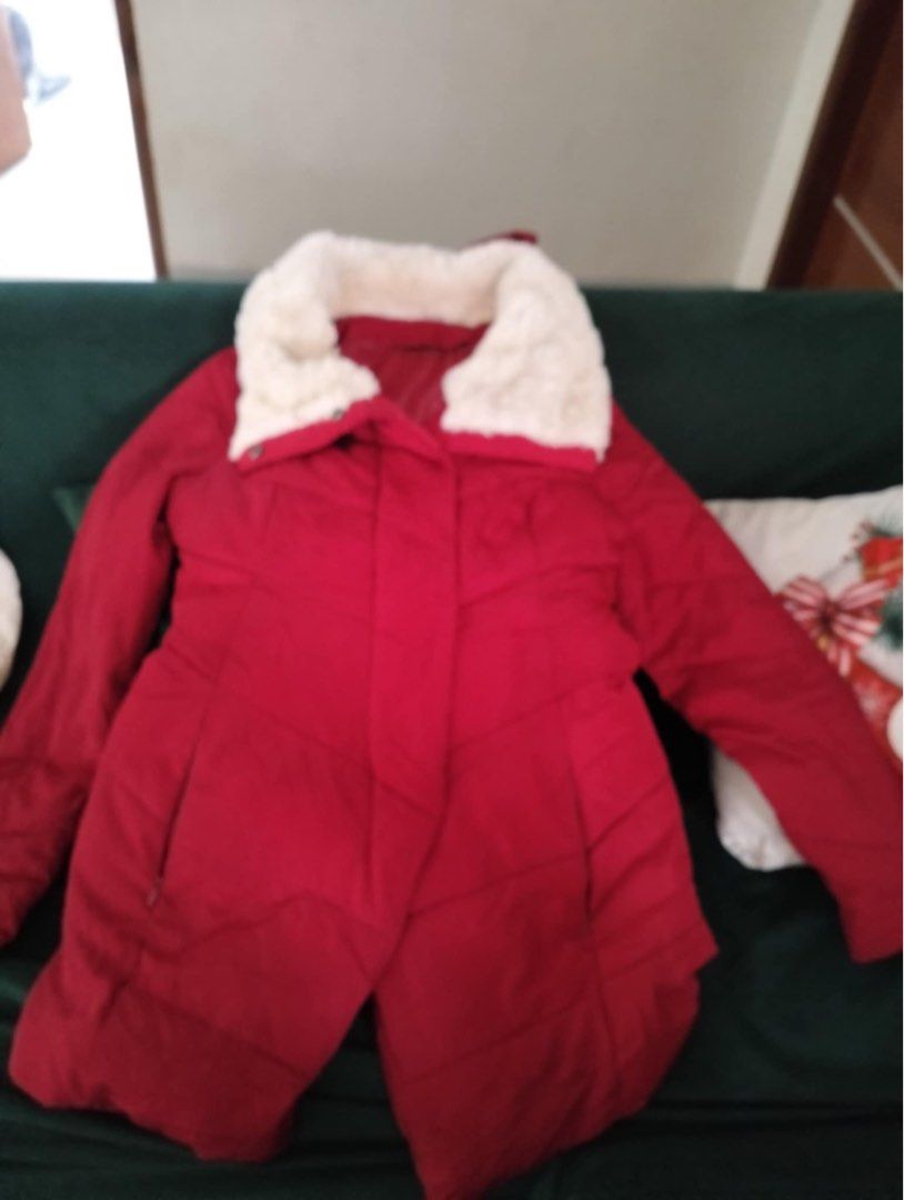 Red Winter Puff Jacket with Hood (Category: Coats, Jackets and Outerwear) located in Dolores. Submitted by solfinds (Listing ID 1414492608, Image 3). Description: - Red winter jacket - Cozy hood - Soft, cream-colored fur collar - Quilted design - Front zipper closure - Warm and suitable for cold weather - Flattering cut - Comfortable and stylish Maganda pa condition. I bought this as preloved so kindly manage you expectation. May tahi lang or rep