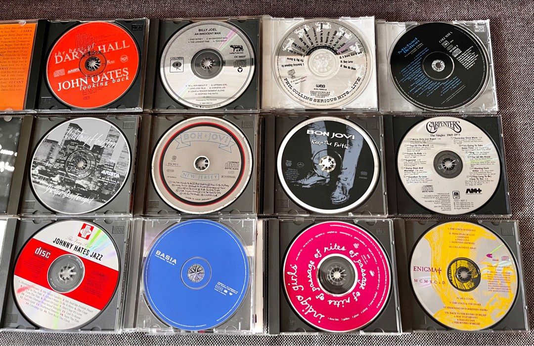 Retro CDs ₱200 each (Category: CDs & DVDs) located in Quezon City. Submitted by junkstar2020 (Listing ID 1414461364, Image 2). Description: Top: Hall and Oates, Billy Joel, Phil Collins, Michael Bolton 2nd: Whitney Houston, Bon Jovi, Carpenters 3rd: Johnny Hates Jazz, Basia, Indigo Girls, Enigma Brenda Russell, Martin Nievera.