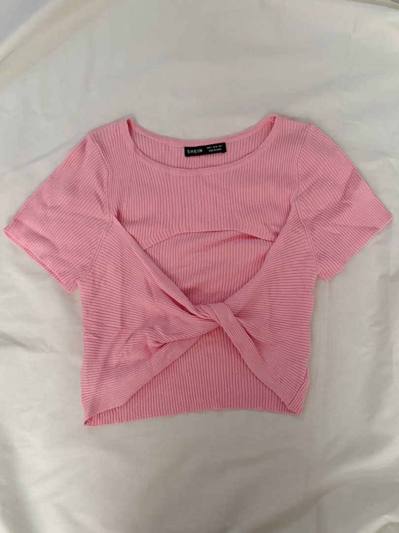 SHEIN Pink Ribbed Knot Crop Top (Category: Shirts) located in Quezon City. Submitted by bthursday (Listing ID 1414522491, Image 1). Description: - SHEIN pink crop top - Ribbed texture - Unique knot detail at the front - Short sleeves - Scoop neckline - Size: S (EU 36, US 4) - Made in China.