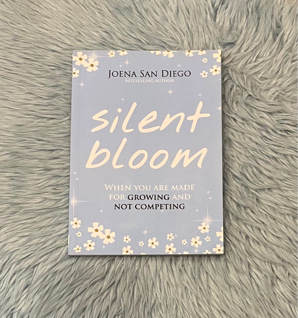 Silent Bloom by Joena San Diego (Category: Storybooks) located in Antipolo. Submitted by _gellavctrn (Listing ID 1414483978, Image 1). Description: - A devotional reminding you that you are not against others, yourself, or God - Anchored in the truth that God is for you in every season - Speaks to the quiet, unseen growth happening in hard days - Encourages patience, faith, and trust in the process - A gentle reminder that the best stories are of