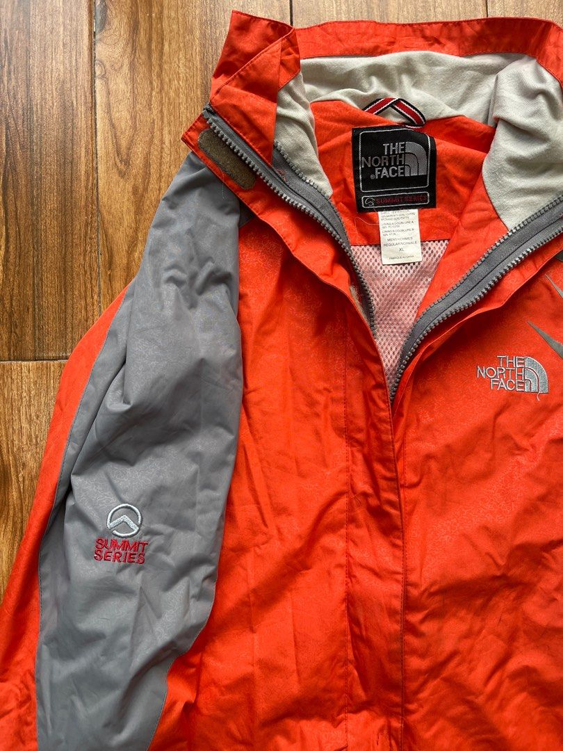 The North Face Summit Series Gore-Tex Jacket XL (Category: Coats, Jackets and Outerwear) located in Manila. Submitted by deadloxarn23439 (Listing ID 1414577833, Image 3). Description: Width- 22 Length- 26 - The North Face Summit Series jacket - Color: Orange and Grey - Size: XL - Features Gore-Tex XCR shell - Zip-up front - Hood included - Summit Series logo on sleeve - North Face logo on chest - Made in China.