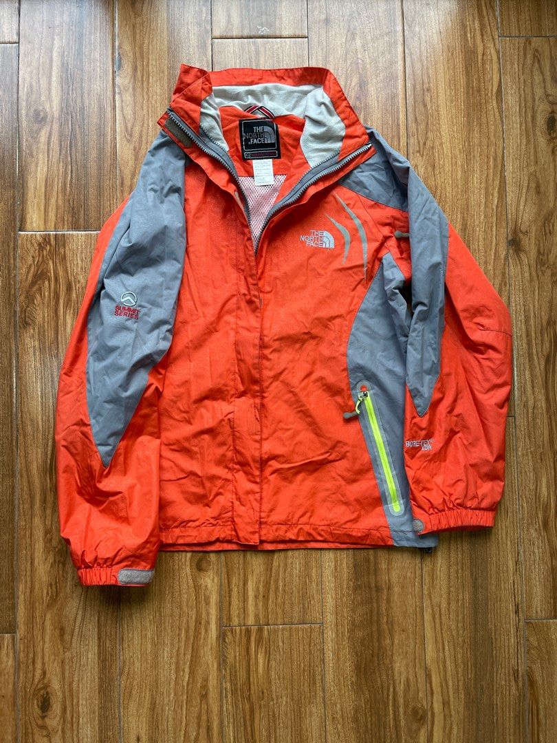 The North Face Summit Series Gore-Tex Jacket XL (Category: Coats, Jackets and Outerwear) located in Manila. Submitted by deadloxarn23439 (Listing ID 1414577833, Image 1). Description: Width- 22 Length- 26 - The North Face Summit Series jacket - Color: Orange and Grey - Size: XL - Features Gore-Tex XCR shell - Zip-up front - Hood included - Summit Series logo on sleeve - North Face logo on chest - Made in China.
