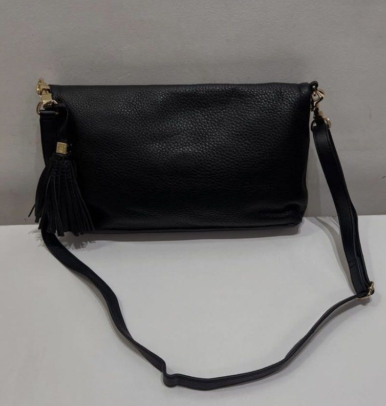 Tory Burch Bag (Thea Fold-over Crossbody) (Category: Luxury Bags & Wallets) located in Marikina City. Submitted by campdaisy_manila (Listing ID 1414494909, Image 3). Description: - Black Tory Burch Thea leather fold-over crossbody bag - Flap closure with Tory Burch logo - Tassel detail - Gold-tone hardware - Dimension in inches: L8 × W14 × D2.