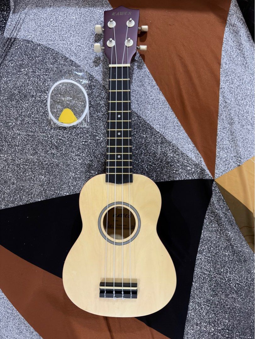 Ukelele 21” Soprano 4 Strings Spruce Basswood (Category: Musical Instruments) located in Olongapo. Submitted by aemax.cgtrading (Listing ID 1414550287, Image 2). Description: Inclusions: String Pick 2pcs yellow Bag.