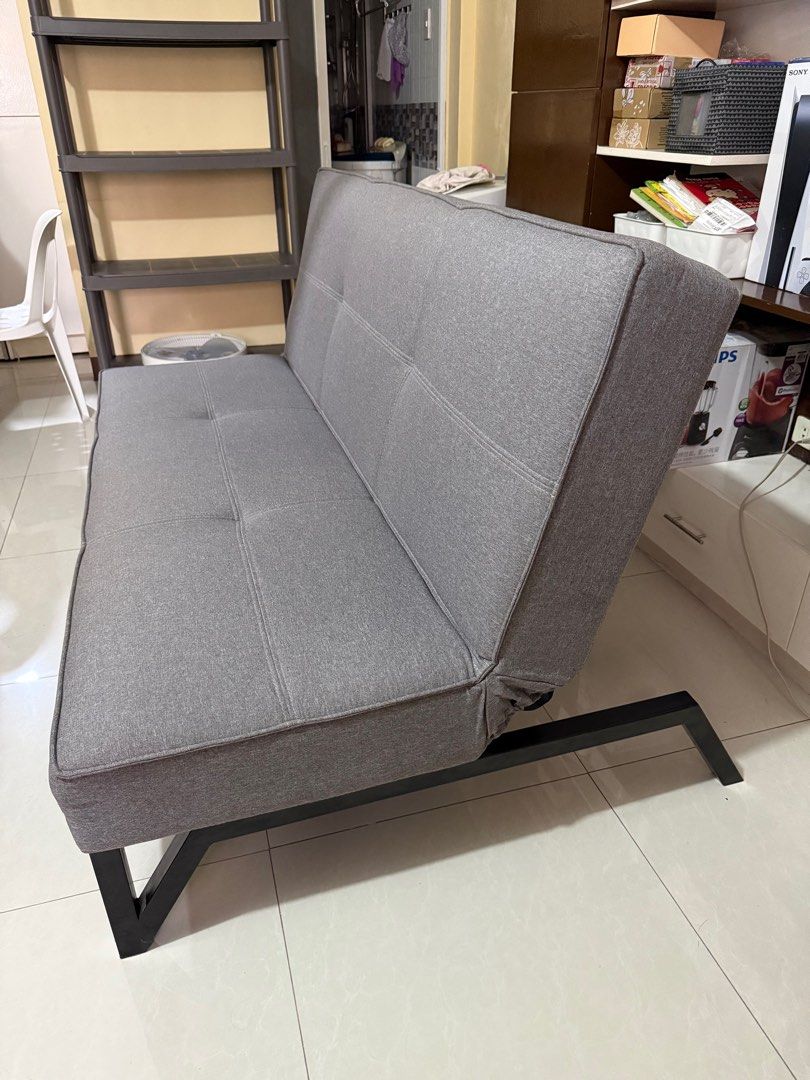 [USED] Crowne Sofa Bed - Light Gray (Category: Sofas) located in Bacoor. Submitted by bbgey (Listing ID 1414462590, Image 2). Description: Selling our SM HOME CROWNE SOFABED - Light Gray Color RFS: bawas bulky things sa bahay Location for pick-up: BFRV, Las Pinas City No issues! PM for sure buyers only. Brand new price is 21,995 at SM Home Everyone loves a multi-purpose essential and a stylish sofabed definitely tops the list—fashionable, functio