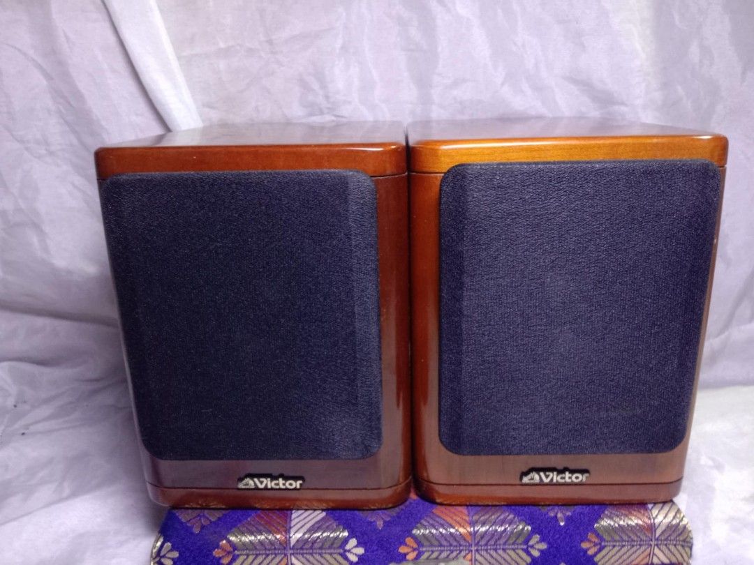 Victor SP-FS1 Speaker System (Category: Soundbars, Speakers & Amplifiers) located in Quezon City. Submitted by jpnvintageonline (Listing ID 1414571578, Image 1). Description: - Victor SP-FS1 speaker system - Wooden cabinet design - Removable speaker covers included - 4-ohm impedance - 20W maximum power handling - Includes original speaker covers - Made by Victor Company of Japan, Limited.