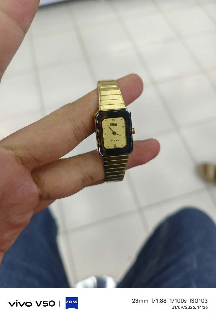 Vintage rado Gold Watch (Category: Women's Watches) located in Zamboanga. Submitted by sarahjaneatari (Listing ID 1414499448, Image 1). Description: - Vintage rado diastar gold-toned watch - Rectangular face with gold dial - Black border - Gold-toned metal link band - Silver back.