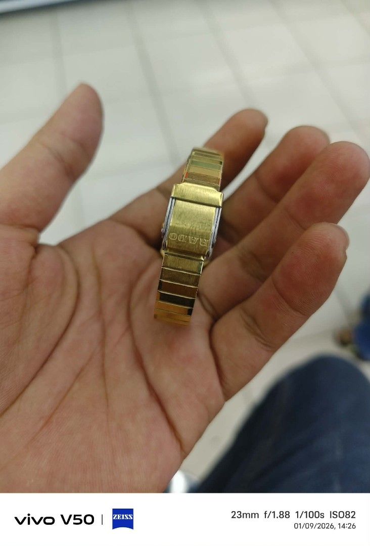 Vintage rado Gold Watch (Category: Women's Watches) located in Zamboanga. Submitted by sarahjaneatari (Listing ID 1414499448, Image 3). Description: - Vintage rado diastar gold-toned watch - Rectangular face with gold dial - Black border - Gold-toned metal link band - Silver back.