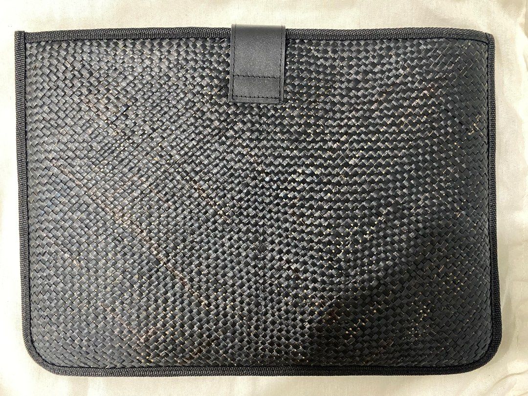 Woven Suklob Laptop/Ipad Sleeve (Category: Laptop Bags & Sleeves) located in Cavite. Submitted by lovedbyniz (Listing ID 1414567038, Image 2). Description: • Brand new with tag and original dust bag. • Original Price: ₱2,399 • Made from handwoven banig • Inner fabric handwoven by local crafts communities • Flap made out of genuine local leather • Magnetic snap • Interior padded with foam • Slot for laptop/iPad/tablet (fits 13-in) .