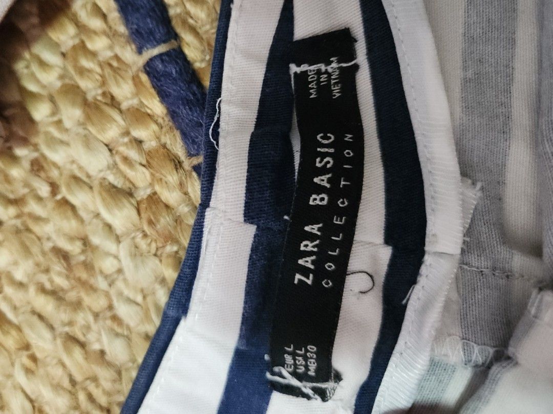 Zara Striped Shorts (Category: Shorts) located in Makati City. Submitted by abbydeclutters (Listing ID 1414497851, Image 3). Description: - Zara Basic striped shorts - Size: L on tag but can fit medium too - Color: White and navy blue stripes Rfs: i don't use this anymore. Note: manage expectations cos its heavily used.